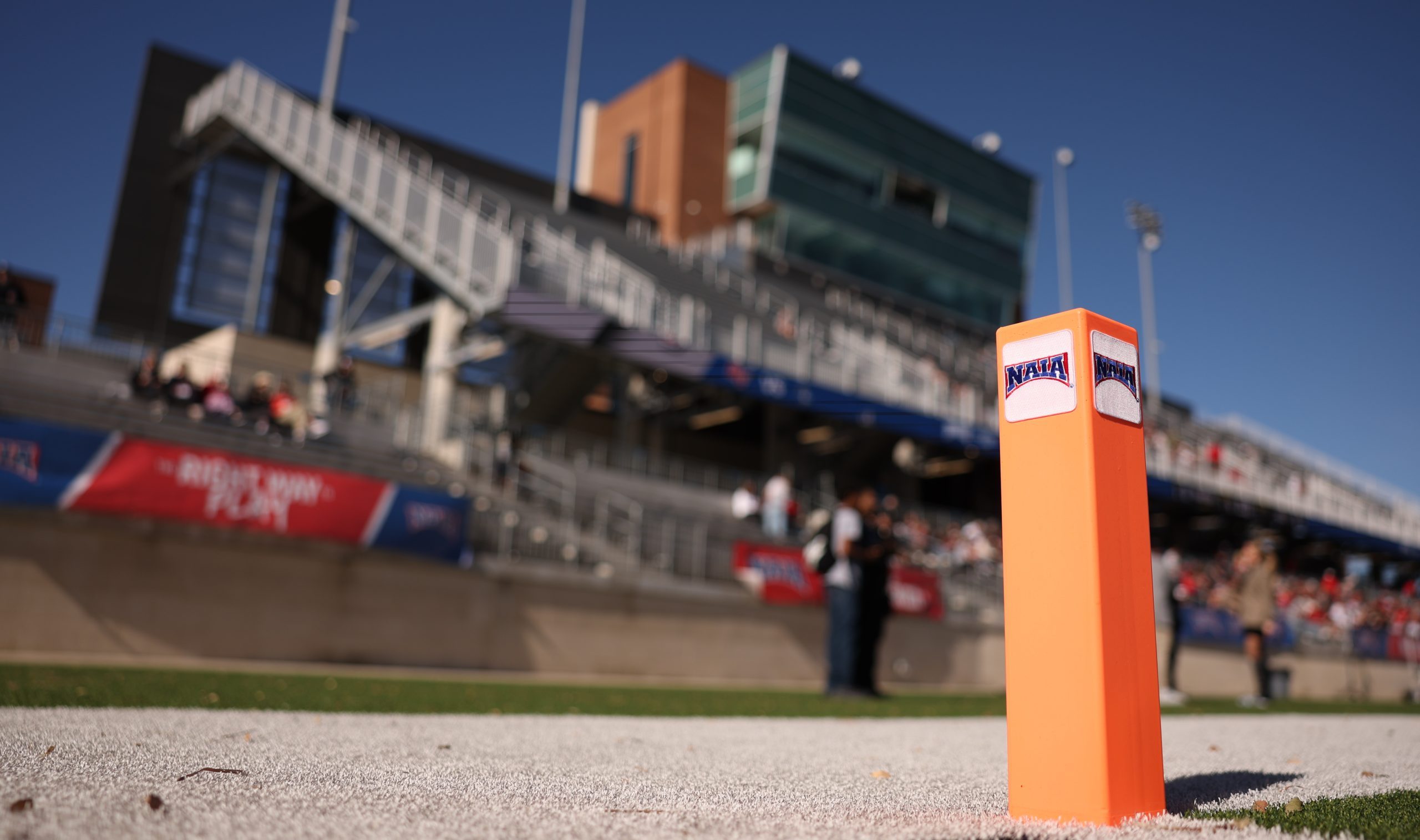 NAIA Pylon with Crowley ISD Stadium in the backdrop